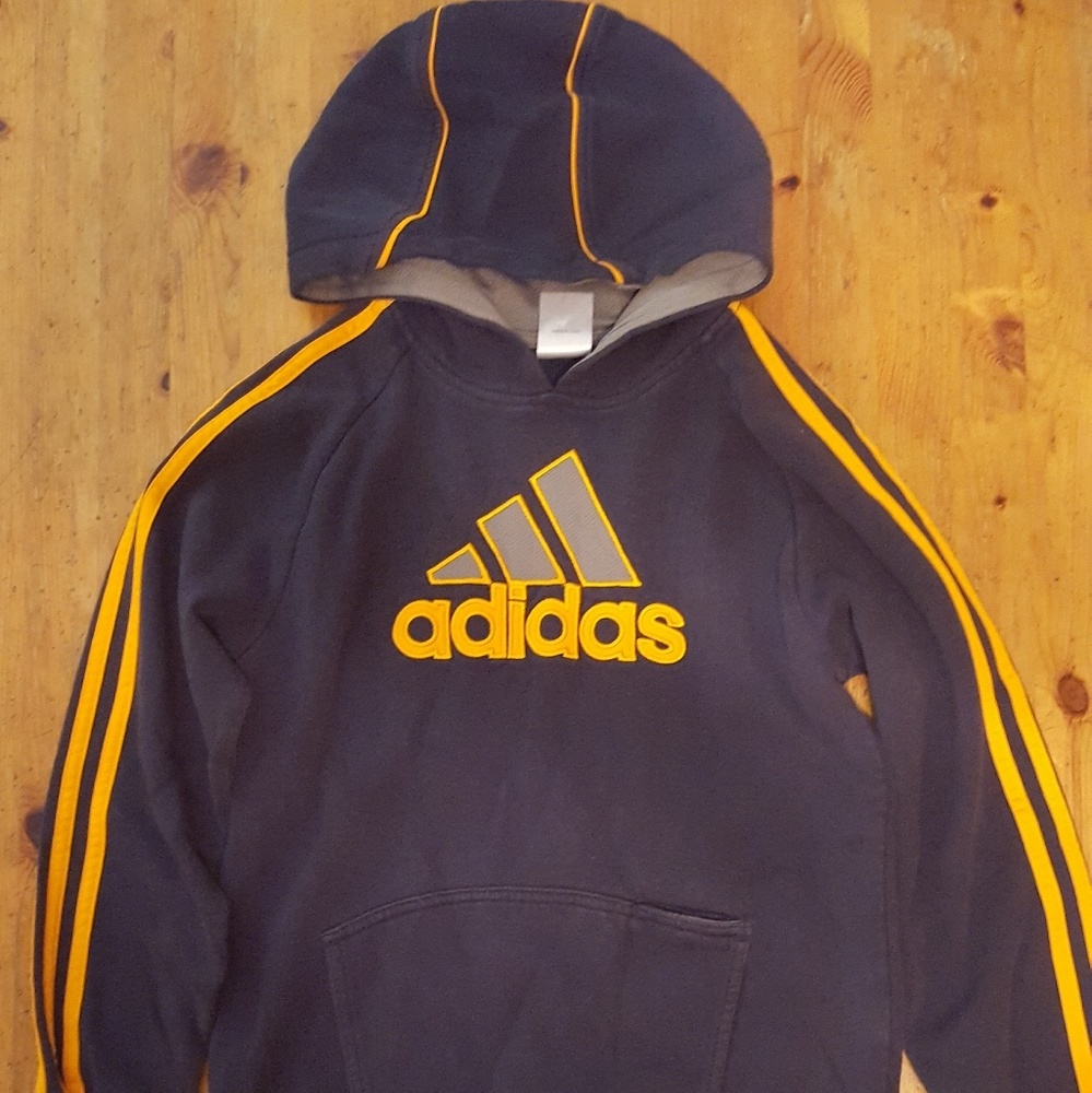 Boy's navy blue and orange Adidas pull over.